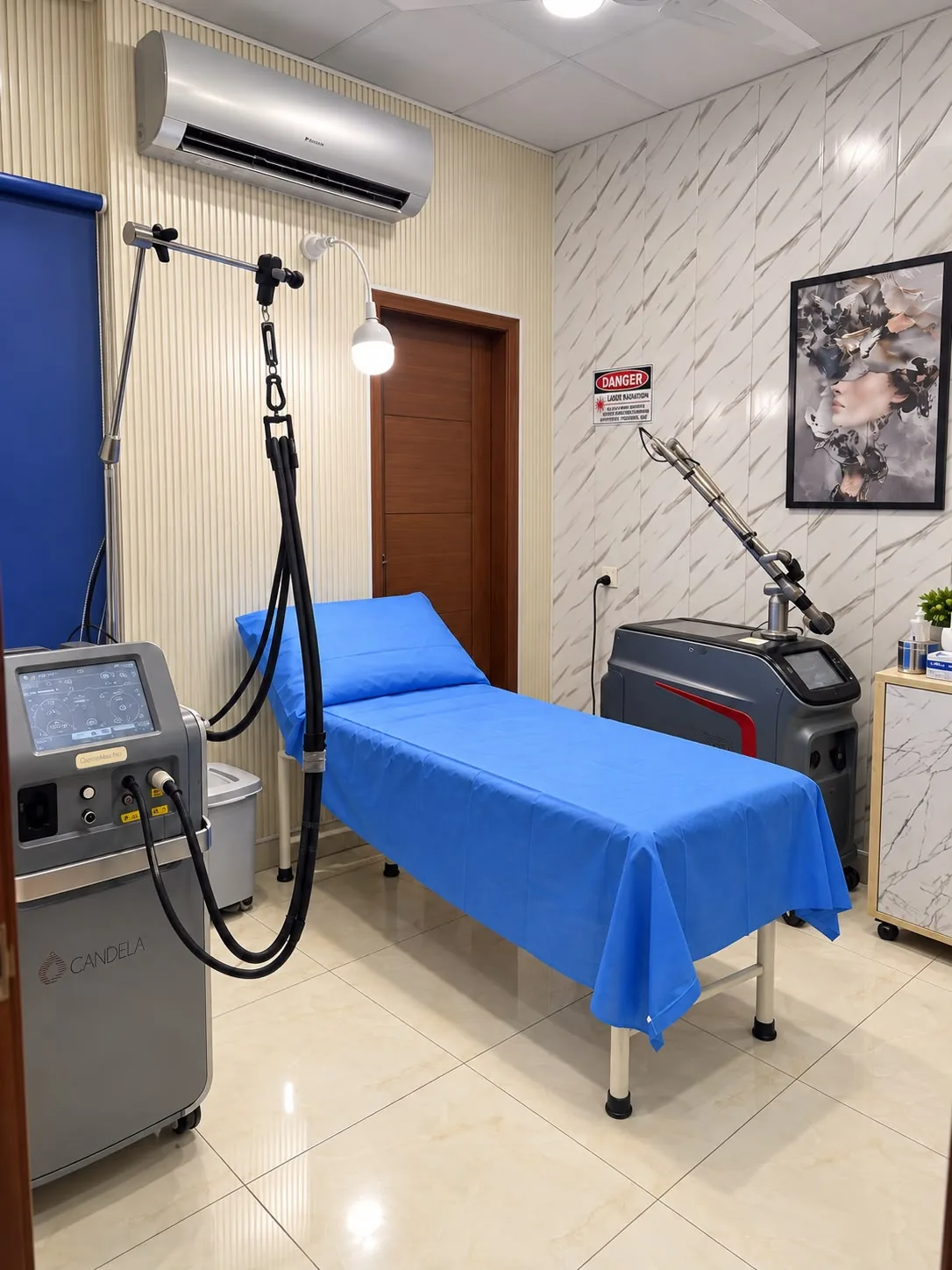 Laser room with a Candela GentleMax Pro and an articulated-arm laser